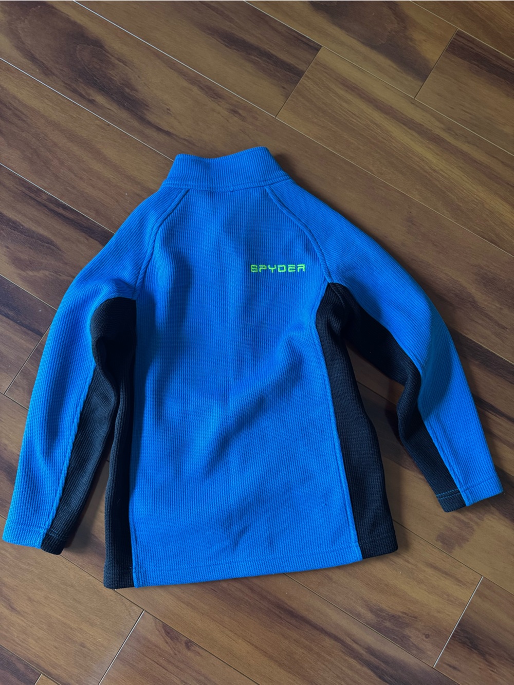 Spyder Kids Royal Blue and Black zip sweater with Neon Logo